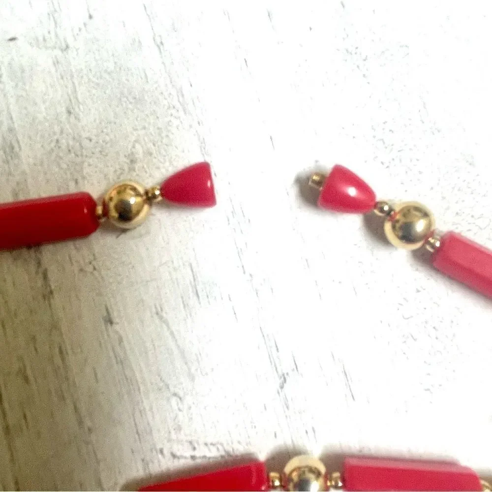 Red and gold tone beaded necklace